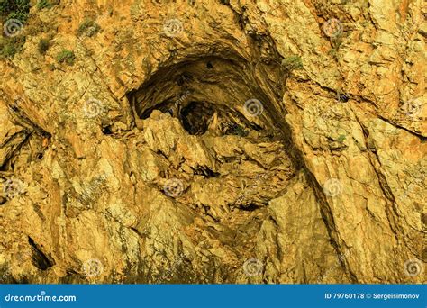 Closeup View On Rocky Mountain With Cave Stock Photo Image Of Yellow