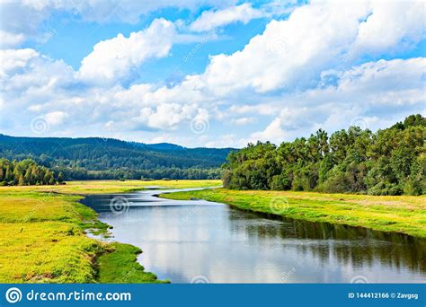 Beautiful Natural River Landscape With Forest And Hills Stock Photo