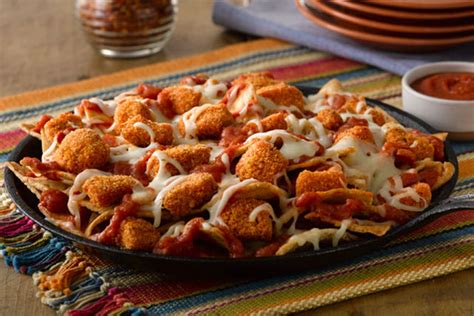 We can totally see why this is a favourite of barry's! Chicken Pizza Nachos - Kraft Recipes