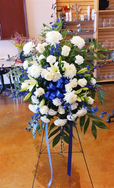 Gorgeous Large Blue And White Sympathy Arrangement With Lilies Mums