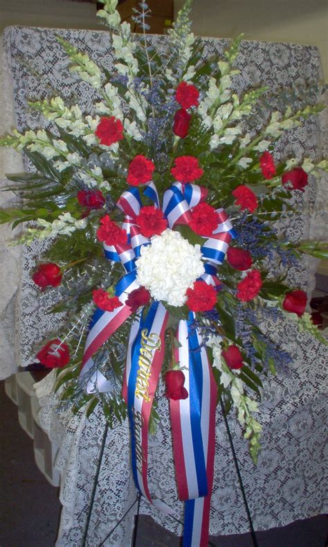You will feel confident choosing us first for all of your funeral floral arrangements. Standing Spray Red, White and Blue … | Sympathy flowers ...