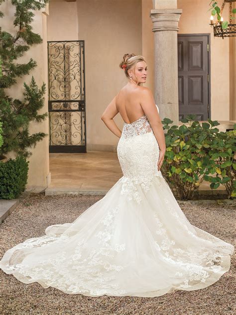 Full formal skirts and large headpieces aren't required at a beach. Top 5 Plus Size Beach Wedding Dresses by Casablanca Bridal ...