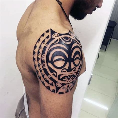 Tribal tattoos for guys on shoulder and arm. 80 Tribal Shoulder Tattoos For Men - Masculine Design Ideas