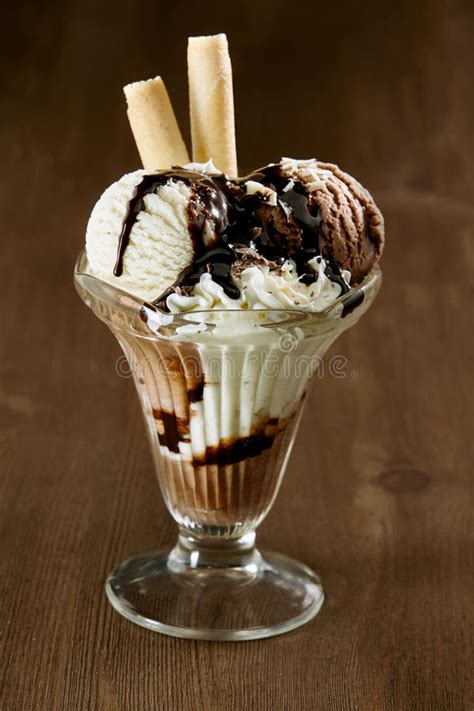 Delicious Vanilla Ice Cream Sundae With Chocolate Stock