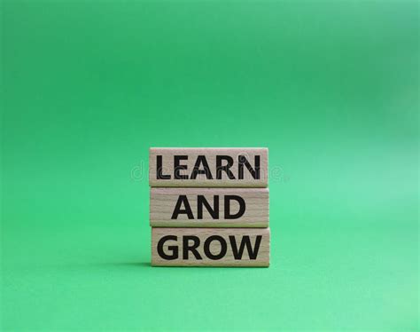 Learn And Grow Symbol Concept Words Learn And Grow On Wooden Blocks