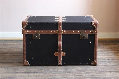 Leather ottomans and coffee tables. Bespoke Black Millerain and leather Trunk / Coffee Table ...