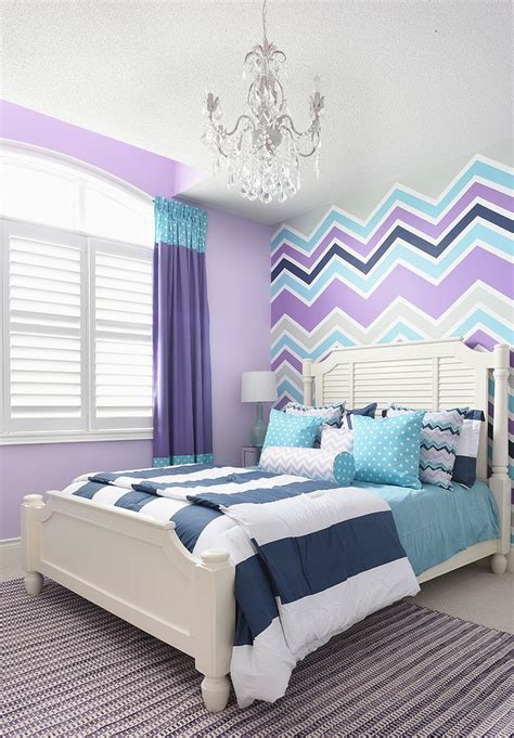 Pink and purple colors are well coordinated to the room's elements including the playhouse with slide. 25 Kids' Bedrooms Showcasing Stylish Chevron Pattern