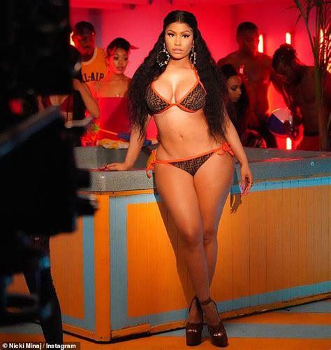 Nicki Minaj Flaunts Curvy Figure In A Bodycon Fendi Dress For A Steamy Set Of Instagram Snaps