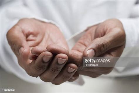 Cupped Hands Male Photos And Premium High Res Pictures Getty Images