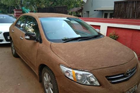 Indian Car Owner Protects Vehicle With Layer Of Cow Dung As Summer