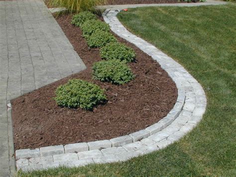 Lawn and garden edging completes the look of a landscape, defines spaces and keeps plants and grass from running wild. paver edging home depot - Paver edging is in the garden ...