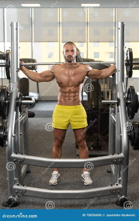 Young Man Doing Exercise Barbell Squat Stock Photo Image Of Fitness