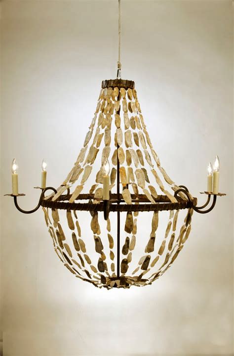 Features the 3r studios oyster shell chandelier is an ideal accent piece for coastal homes. Oyster Shell Chandelier Ideas - HomesFeed