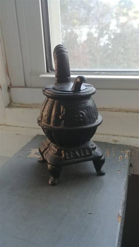And luckily enough that you have us. Vintage 30s cast iron cooking stove - miniature Amish folk ...