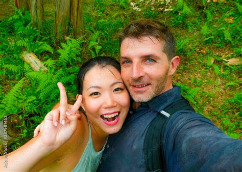 Young Beautiful And Happy Mixed Ethnicity Couple Beautiful Asian Chinese Woman And White Man In