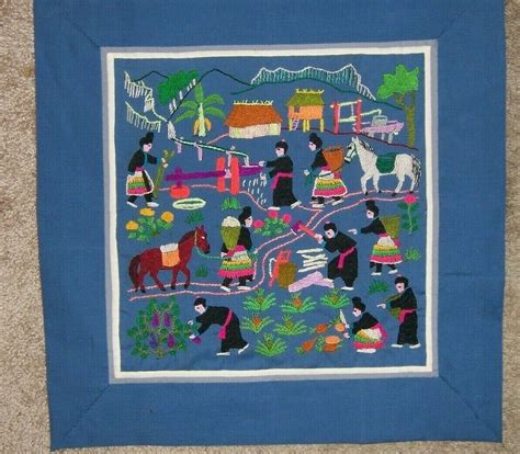 hmong-story-cloth-depicting-life-in-a-hmong-village-in