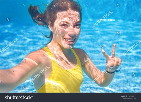 Child Swims Underwater Swimming Pool Happy Stock Photo 1763186177