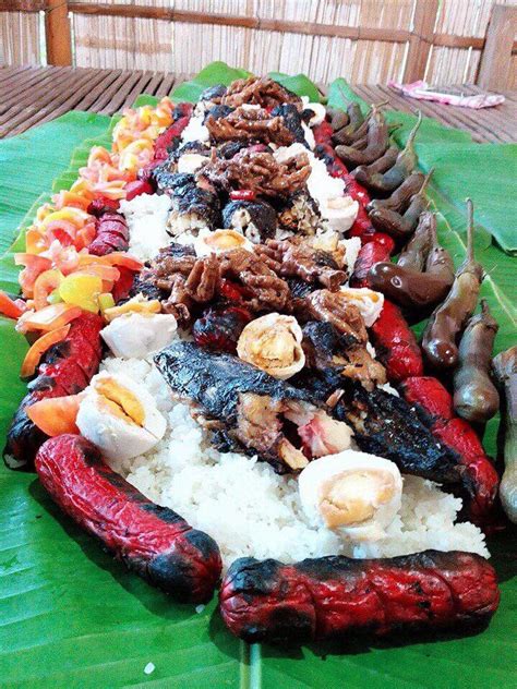Filipino Favourites Served In A Boodle Fight Filipino Dishes Filipino
