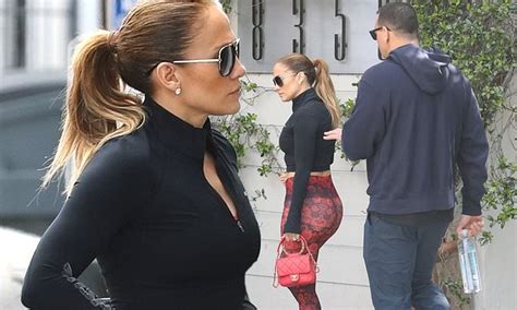 Jennifer Lopez Shows Off Sculpted Midriff As She Models Rose Leggings