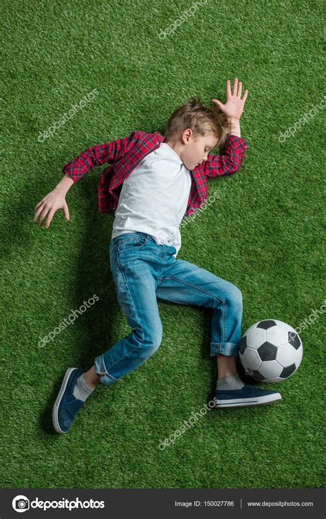 Boy With Soccer Ball — Stock Photo © Arturverkhovetskiy 150027786