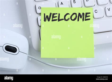 welcome new employee colleague refugees refugee immigrants computer business concept mouse desk