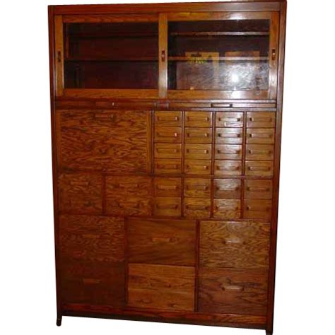 Oak doctor's office cabinet-32 drawers-books-desk | Office cabinets, Cabinet, Tall cabinet storage