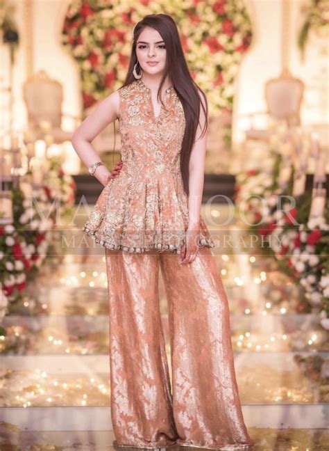 Modern pakistani bride wearing off the shoulder bridal dress at her wedding. Brides sister baraat outfit | Pakistani wedding dresses ...