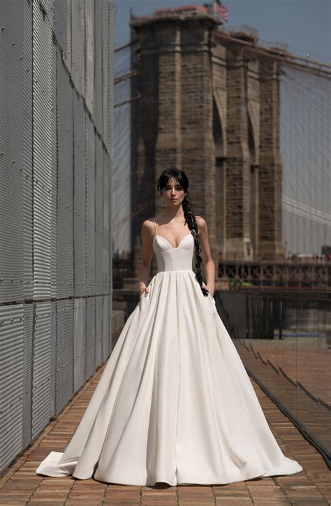 ✨ introducing the #laylagown pictured here in sunset. Everything We Know About Ashley Iaconetti's Two Wedding ...