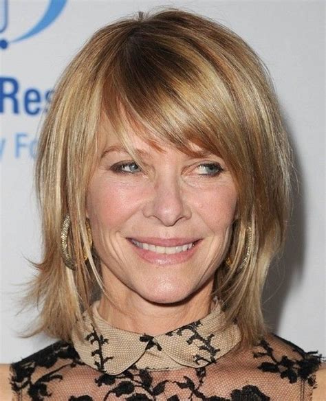 There is no center part visible but the blunt straight bangs do all the talking because bangs do frame the face, highlight the eyes, and hide the forehead, they're ideal for older women. How To Knock Out Forehead Wrinkles This Spring | Medium hair styles for women, Medium hair ...