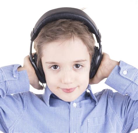 Young Cute Boy Is Listening To Music Stock Photo Image Of Singing