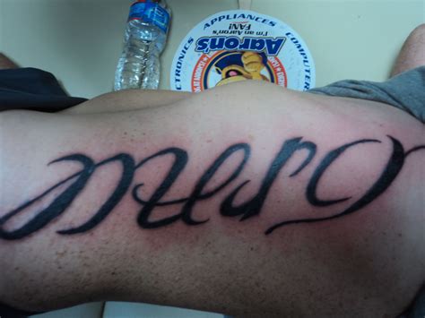 ambigram tattoo.....Grace/Mercy. I would love to have a much smaller