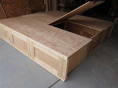 • this is a players platform bed. diy king bed plans | DIY King Size Bed - Center Storage ...