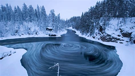 The Whirlpool In Myllykoski Scenic Area At Winter In Oulanka National
