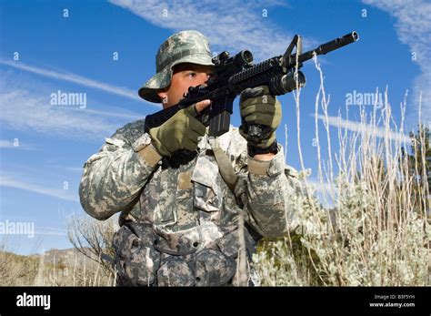 Soldier Aiming Machine Gun Stock Photo Alamy