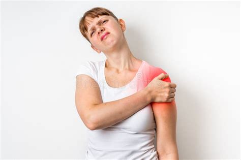 Woman With Shoulder Pain Is Holding Her Aching Arm Stock Image Image