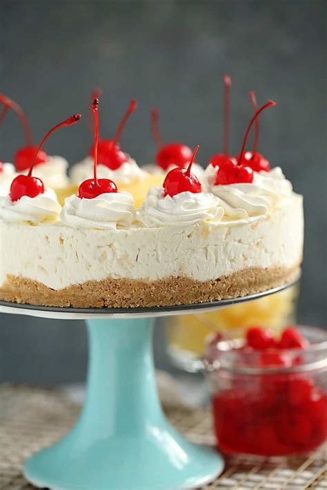 Add the coffee mixture to cheesecake batter along with sour cream and vanilla mixing until just combined then using a whisk, mix the chocolate and cream until a silky texture. Pina Colada Cheesecake | It's A Mother Thing | Recipe in ...