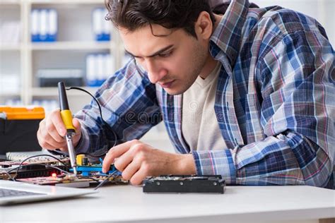 Computer Hardware Repair And Fixing Concept By Experienced Techn Stock