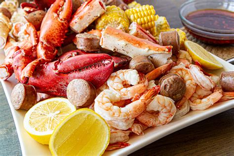 Seafood Boil With Red Spicy Garlic Butter Dipping Sauce — Vietnamese