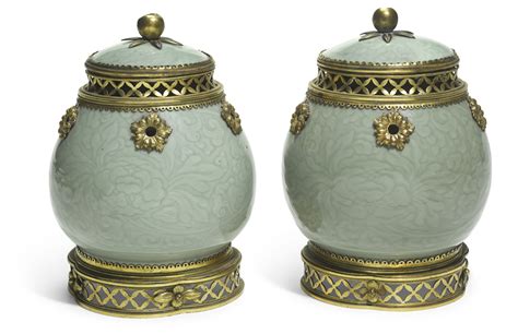436 A Pair Of Gilt Metal Mounted Chinese Green Celadon Ovoid Vases
