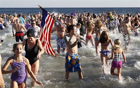 Thousands Ring In The New Year With Annual Polar Bear Plunge Tradition