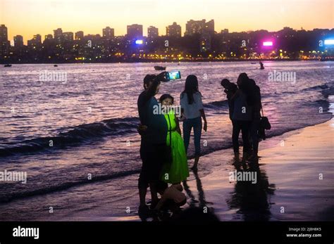 Mumbai Maharashtra India People Takes Selfies At Sunset At Girgaon