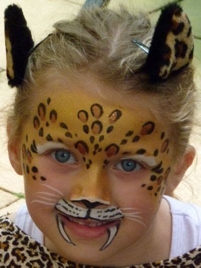 Tribal face painting ideas can be lots of fun to recreate. leopard face paint | Face Paint | Progetti per pittura del ...