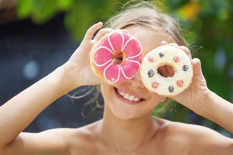 Girl Eating Donuts Stock Image Image Of Breakfast Bakery 54496007