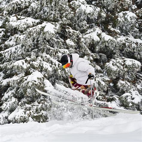 Young Man On Skis Doing Tricks With Ski Poles Stock Image Image Of