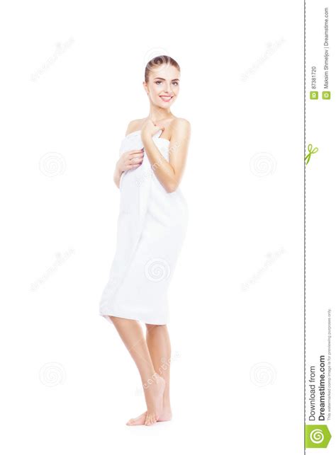 Young Beautiful And Natural Woman Wrapped In Towel Isolated On Stock