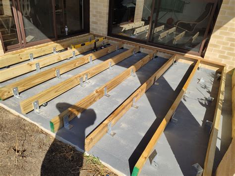 If you have a concrete slab that is in good shape it is very. Merbau decking over concrete slab | Bunnings Workshop ...