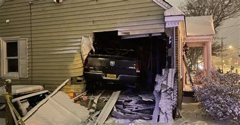 Truck Crashes Into Norfolk Home During Snow Storm