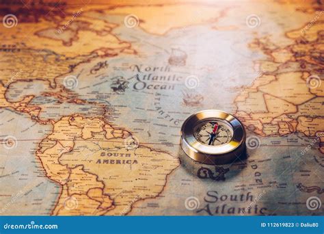 Old Vintage Retro Golden Compass On Ancient Map Selective Focus Stock