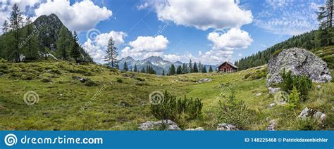 Idyllic Mountain Landscape In The Alps Mountain Chalet Meadows And