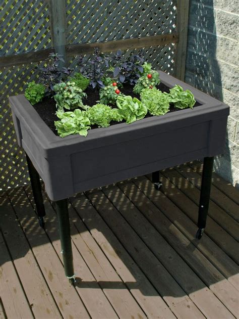 Elevated Garden Table With Adjustable Legs Casters